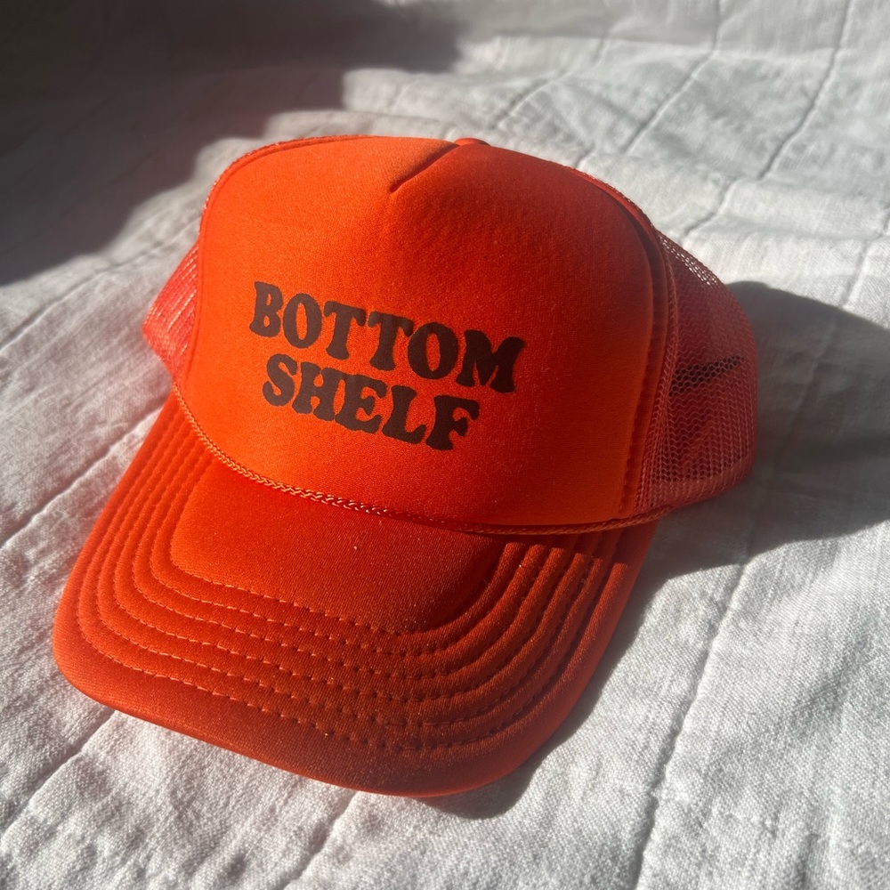 orange trucker hat